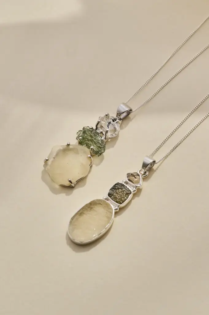 Two Awaken pendant necklaces set with Moldavite, Herkimer Diamond and Libyan Desert Glass