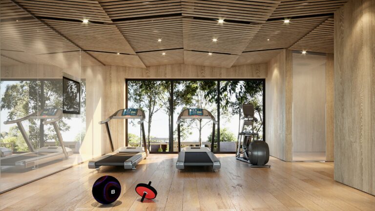A home gym lined in pale timber, with floor-to-ceiling windows onto trees
